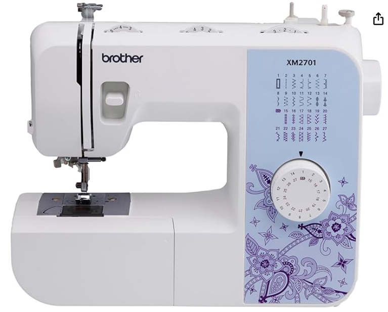 A white sewing machine with blue and purple embellishments