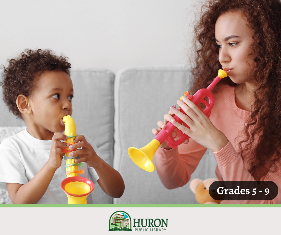 Image of teen and child playing toy trumpets