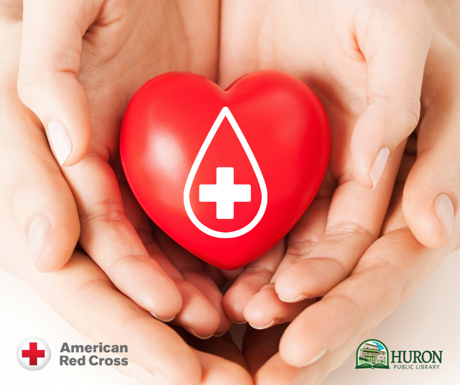 Image of hands holding heart with red cross logo